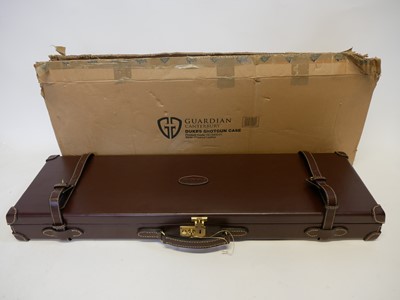 Lot 497 - New unused Guardian leather shotgun case, with...