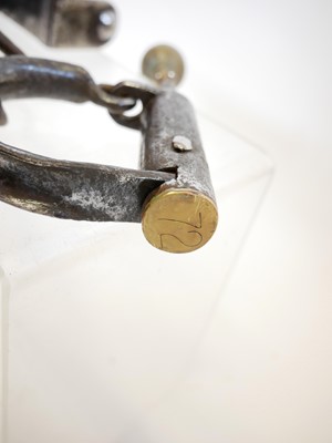 Lot 240 - Pair of hand cuffs and a bar lock (lacking the...