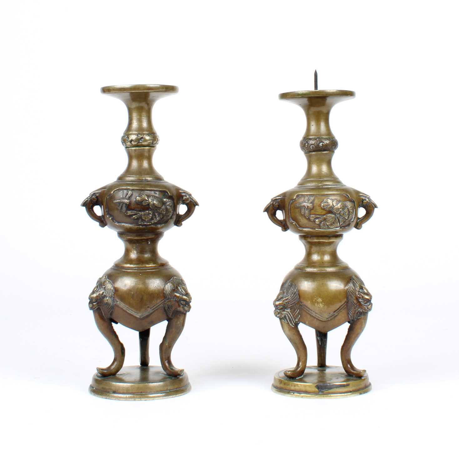 Lot 12 - A Pair of Chinese Bronze Twin-Handled Pricket Candlesticks