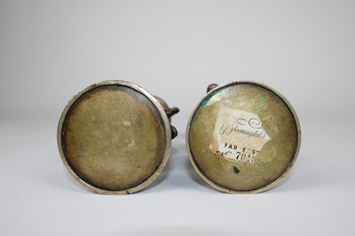 Lot 12 - A Pair of Chinese Bronze Twin-Handled Pricket Candlesticks
