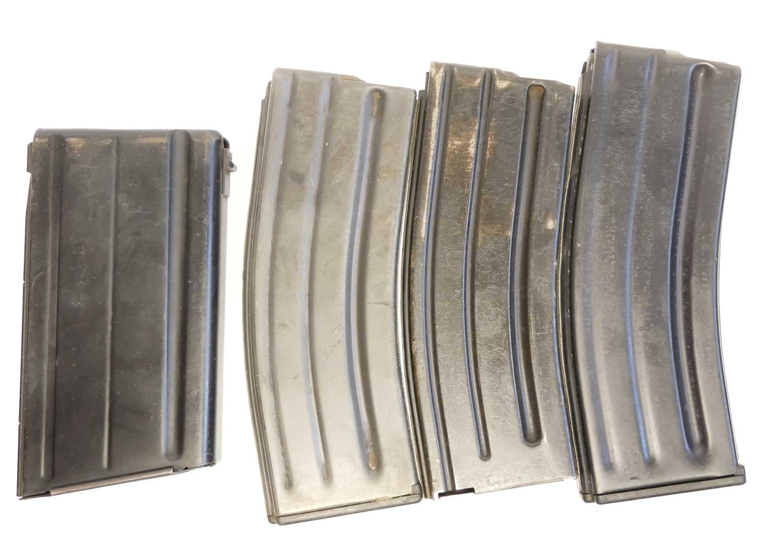 Lot 519 - Three 5.56mm magazines for the SA80 / AR15,...