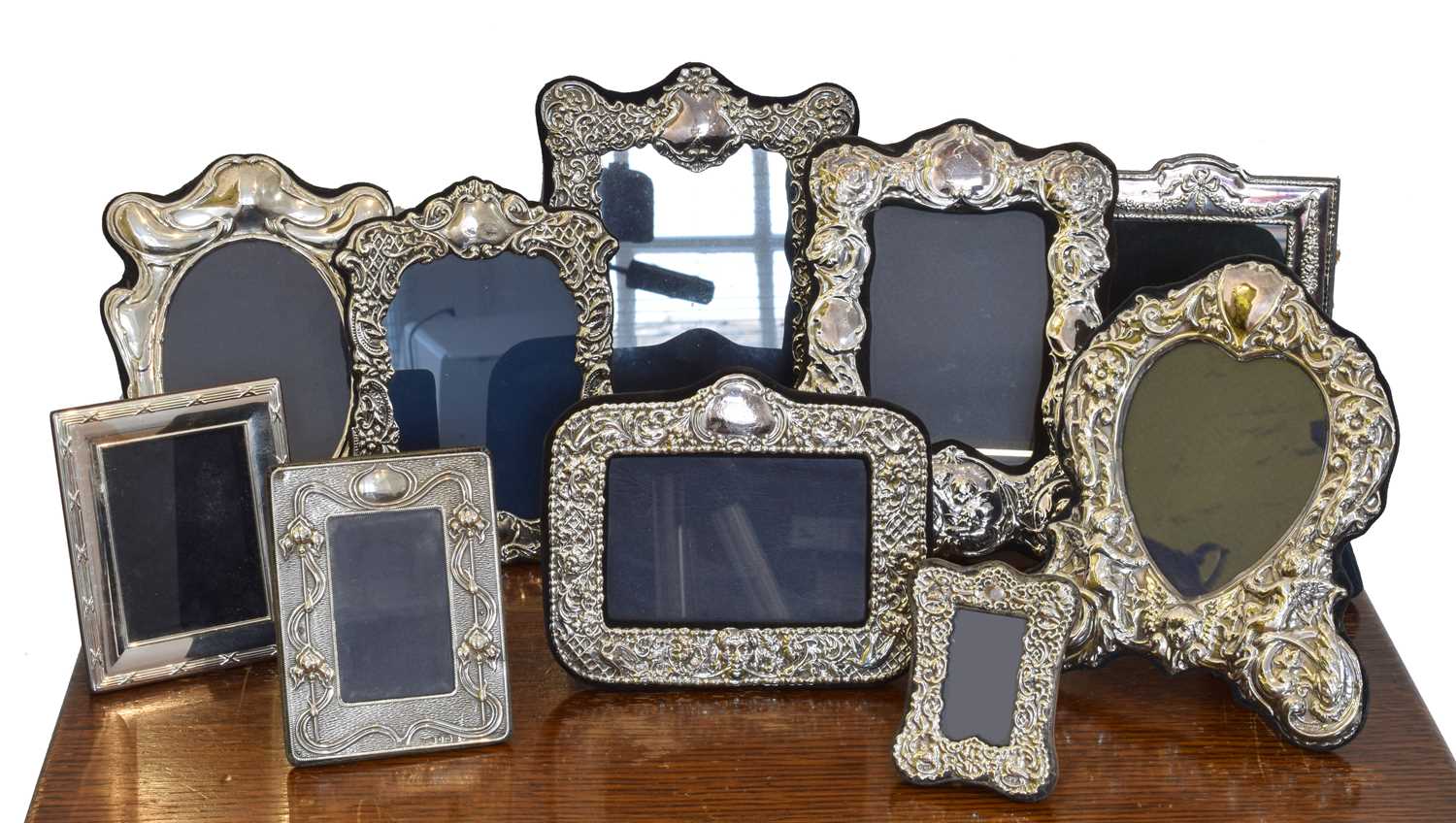Lot 41 - A selection of silver fronted frames.