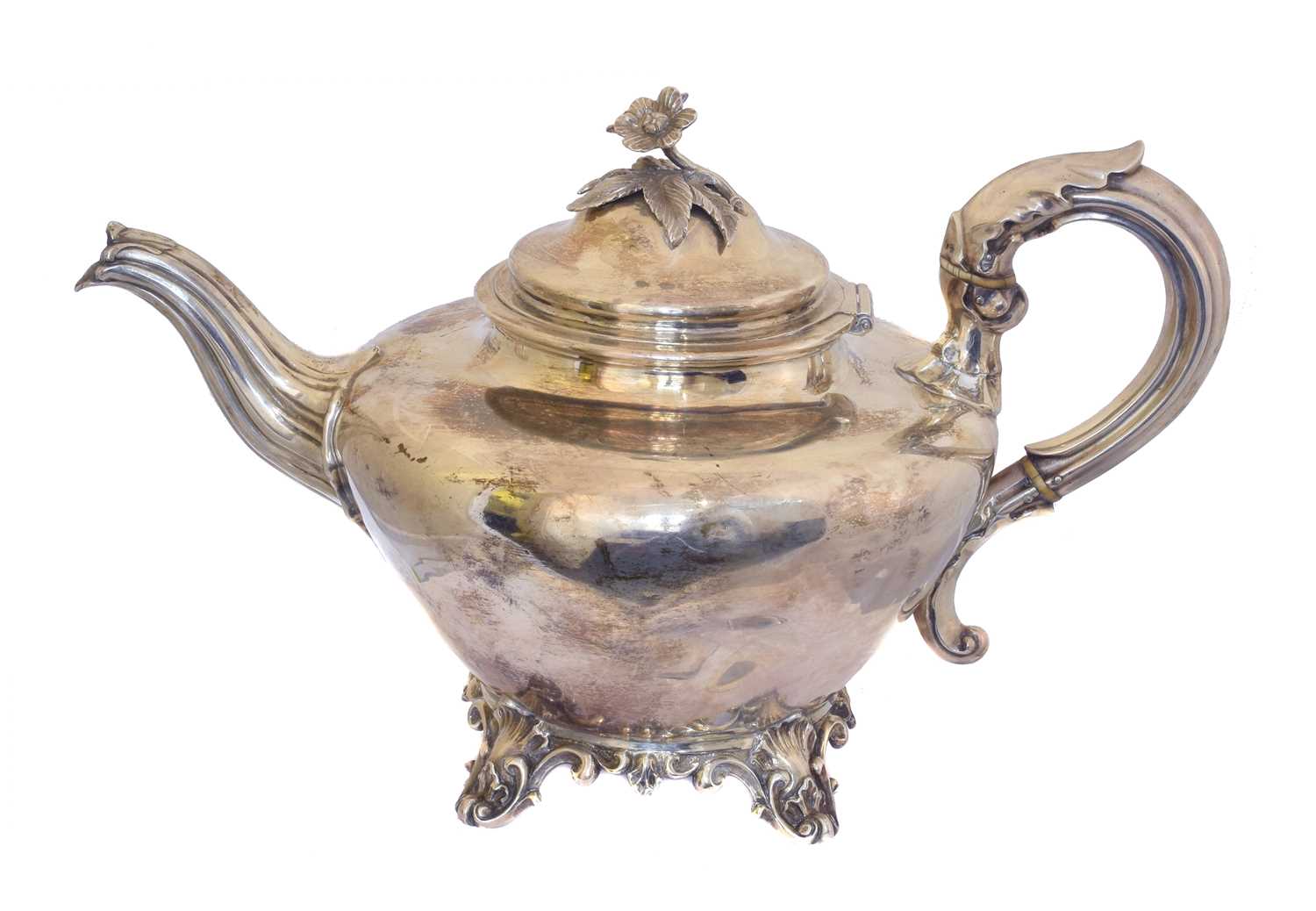 Lot 55 - A Victorian silver teapot.