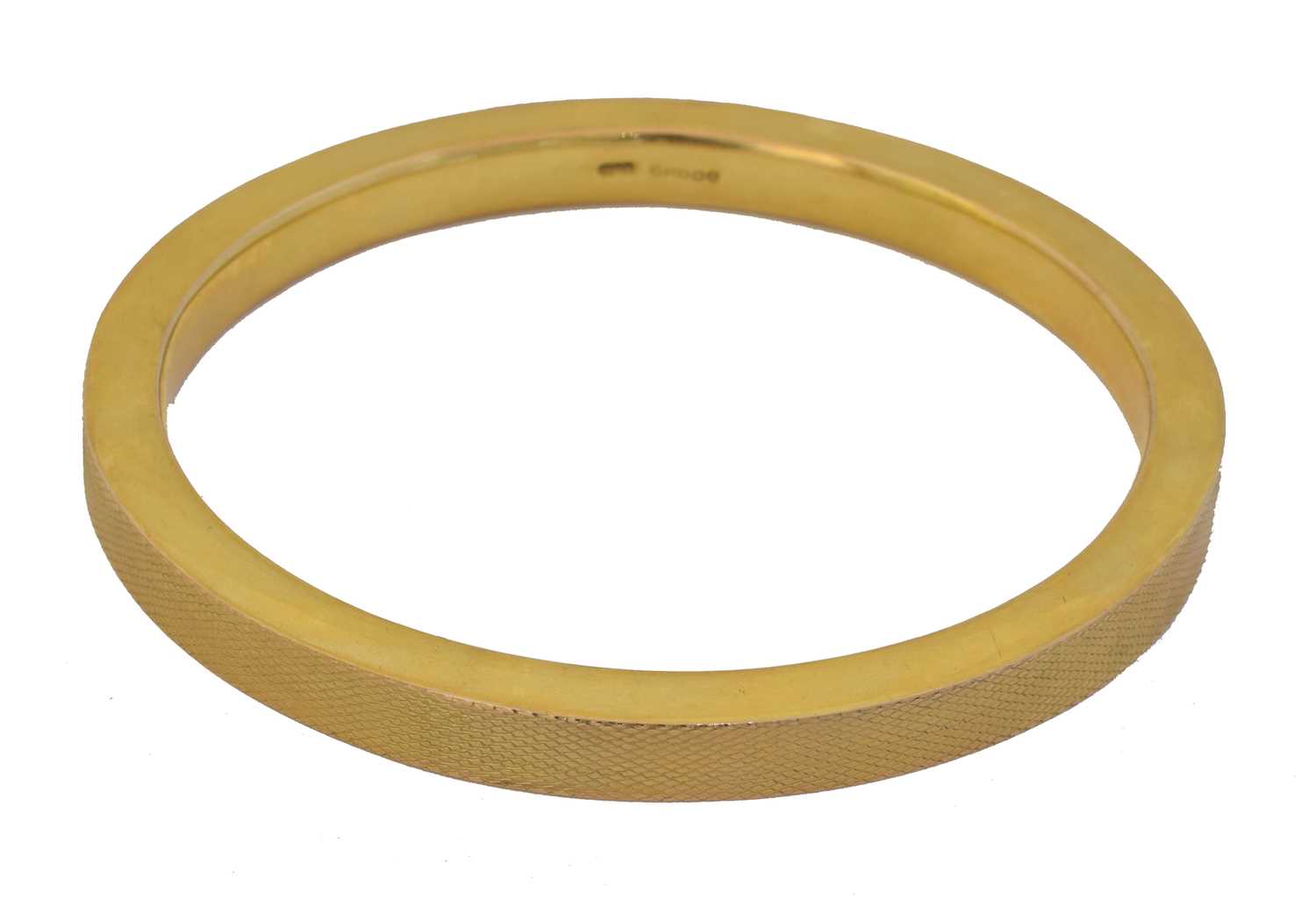 Lot 44 - A 1920s 9ct gold bangle by Nathan Brothers.
