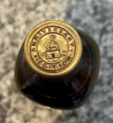 Lot 56 - 1 bottle in Original Packaging and protective sleeve Bushmills