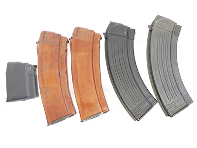 Lot 448 - Five AK magazines, including two Bakelite AK74...