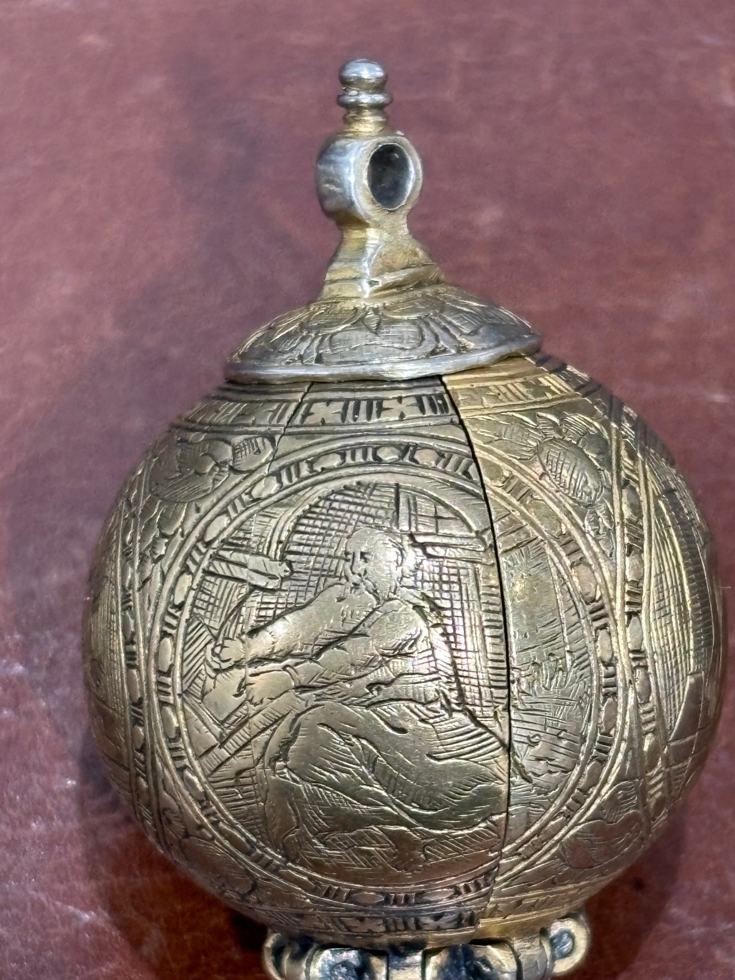 Lot 179 - A silver gilt pomander.