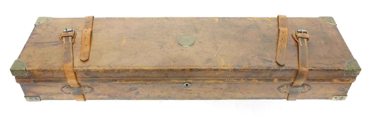 Lot 397 - Leather and oak gun case, with reinforced...