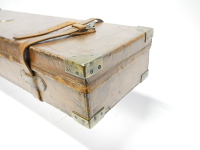 Lot 397 - Leather and oak gun case, with reinforced...