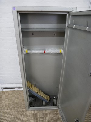 Lot 407 - Steel gun cabinet with two sets of keys.