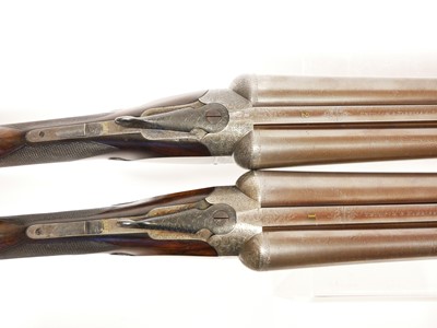 Lot 307 - Trulock and Harriss cased pair of 12 bore side...