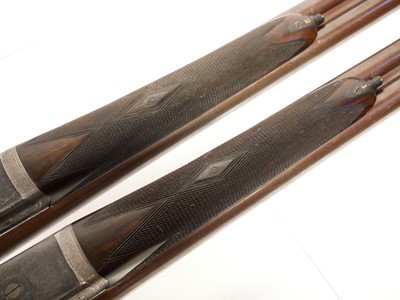 Lot 307 - Trulock and Harriss cased pair of 12 bore side...