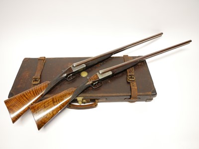 Lot 307 - Trulock and Harriss cased pair of 12 bore side...