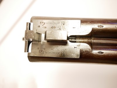 Lot 307 - Trulock and Harriss cased pair of 12 bore side...