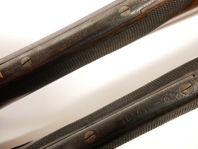 Lot 307 - Trulock and Harriss cased pair of 12 bore side...
