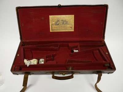 Lot 307 - Trulock and Harriss cased pair of 12 bore side...