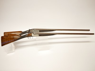 Lot 307 - Trulock and Harriss cased pair of 12 bore side...