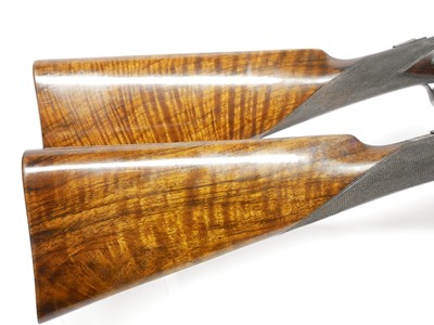 Lot 307 - Trulock and Harriss cased pair of 12 bore side...