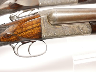 Lot 307 - Trulock and Harriss cased pair of 12 bore side...