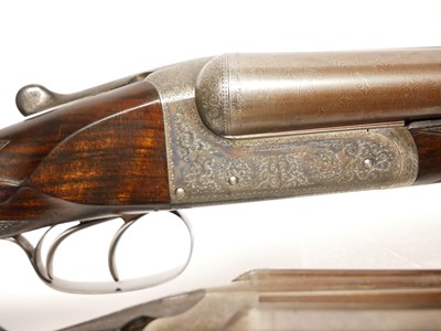Lot 307 - Trulock and Harriss cased pair of 12 bore side...