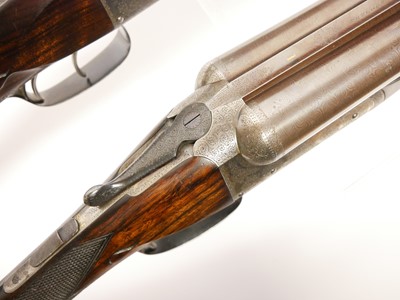 Lot 307 - Trulock and Harriss cased pair of 12 bore side...