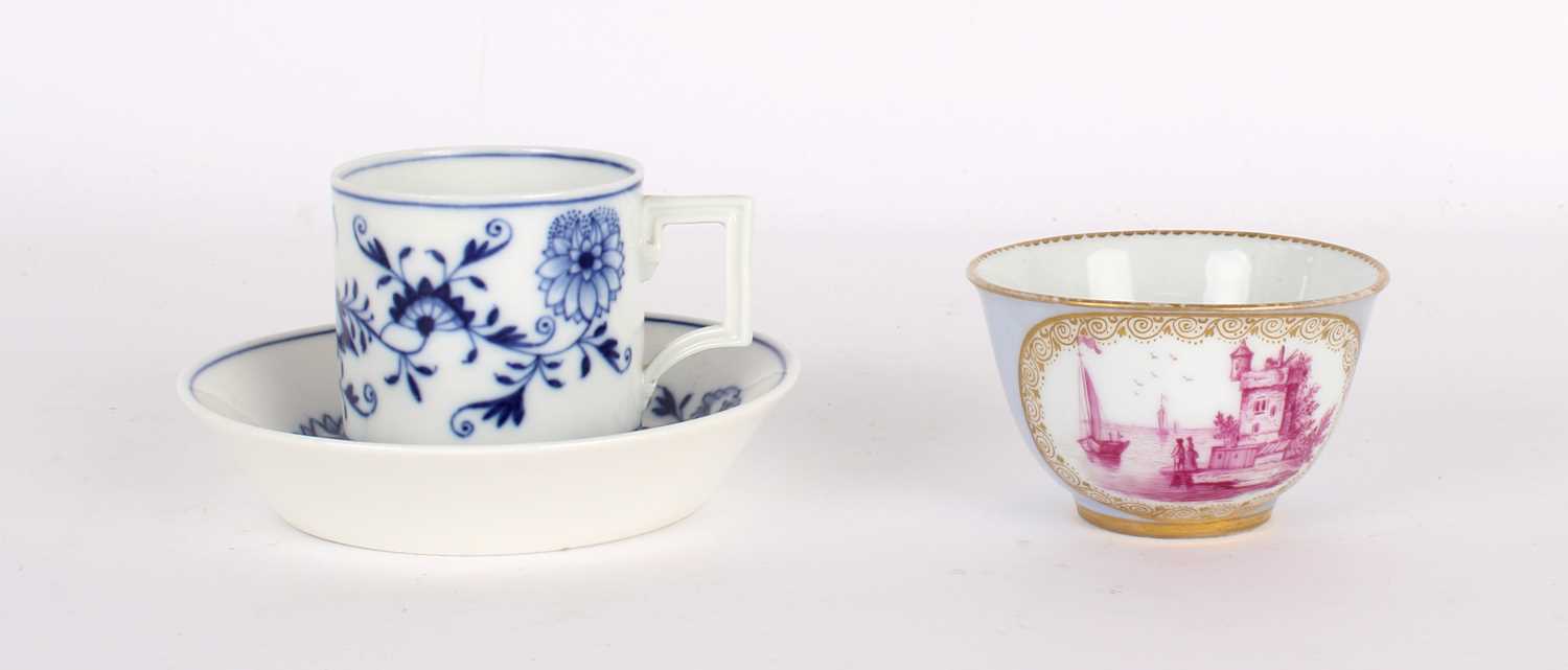 Lot 45 - A "Blue Onion" Pattern Coffee Cup and Saucer by Meissen