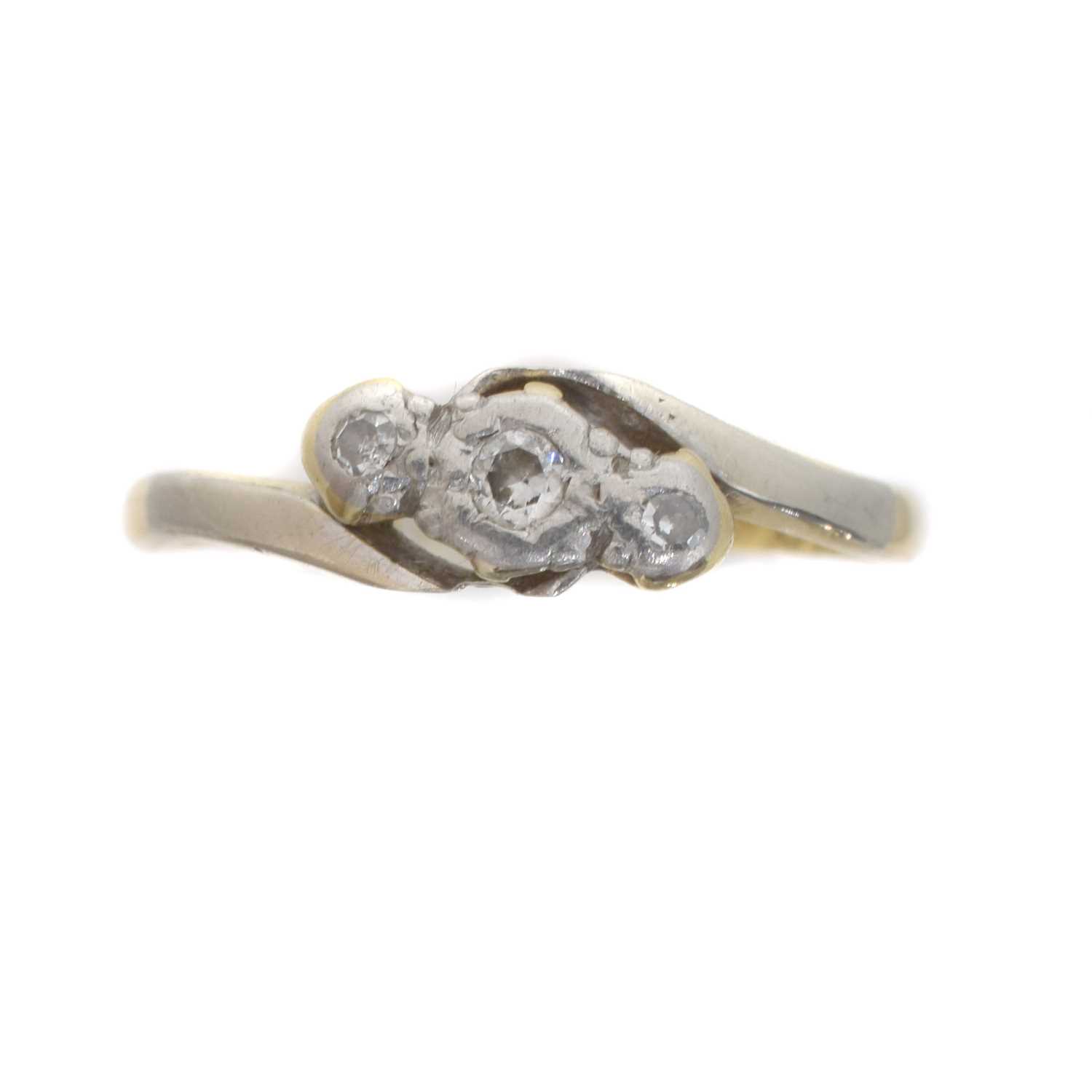 Lot 43 - A diamond three stone ring.