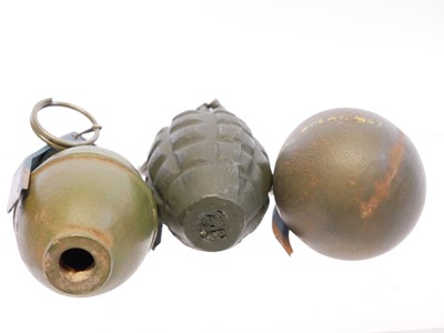 Lot 158 - Three inert hand grenades.