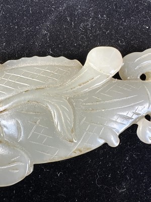 Lot 17 - A Chinese Carved Celadon Jade Fish