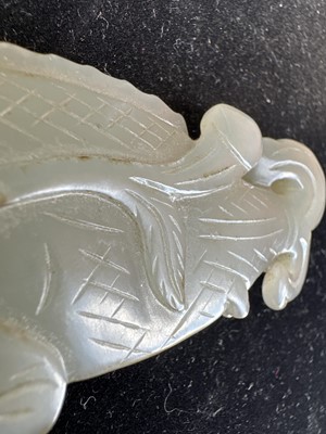 Lot 17 - A Chinese Carved Celadon Jade Fish