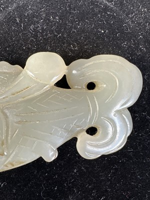 Lot 17 - A Chinese Carved Celadon Jade Fish
