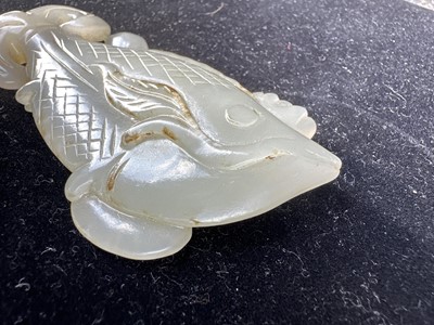Lot 17 - A Chinese Carved Celadon Jade Fish