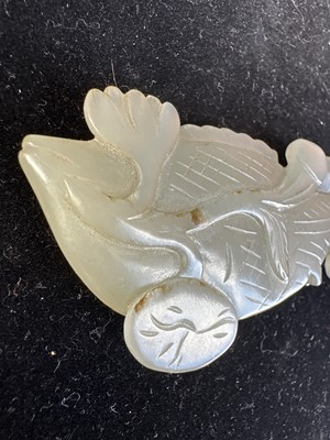 Lot 17 - A Chinese Carved Celadon Jade Fish