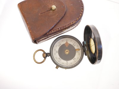 Lot 222 - Marching compass with original leather case...