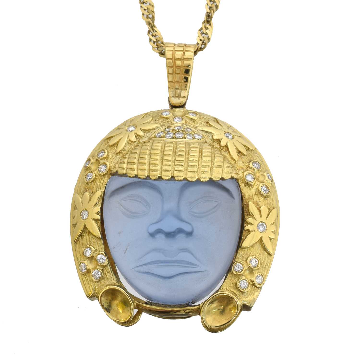 Lot 28 - A glass and diamond pendant.
