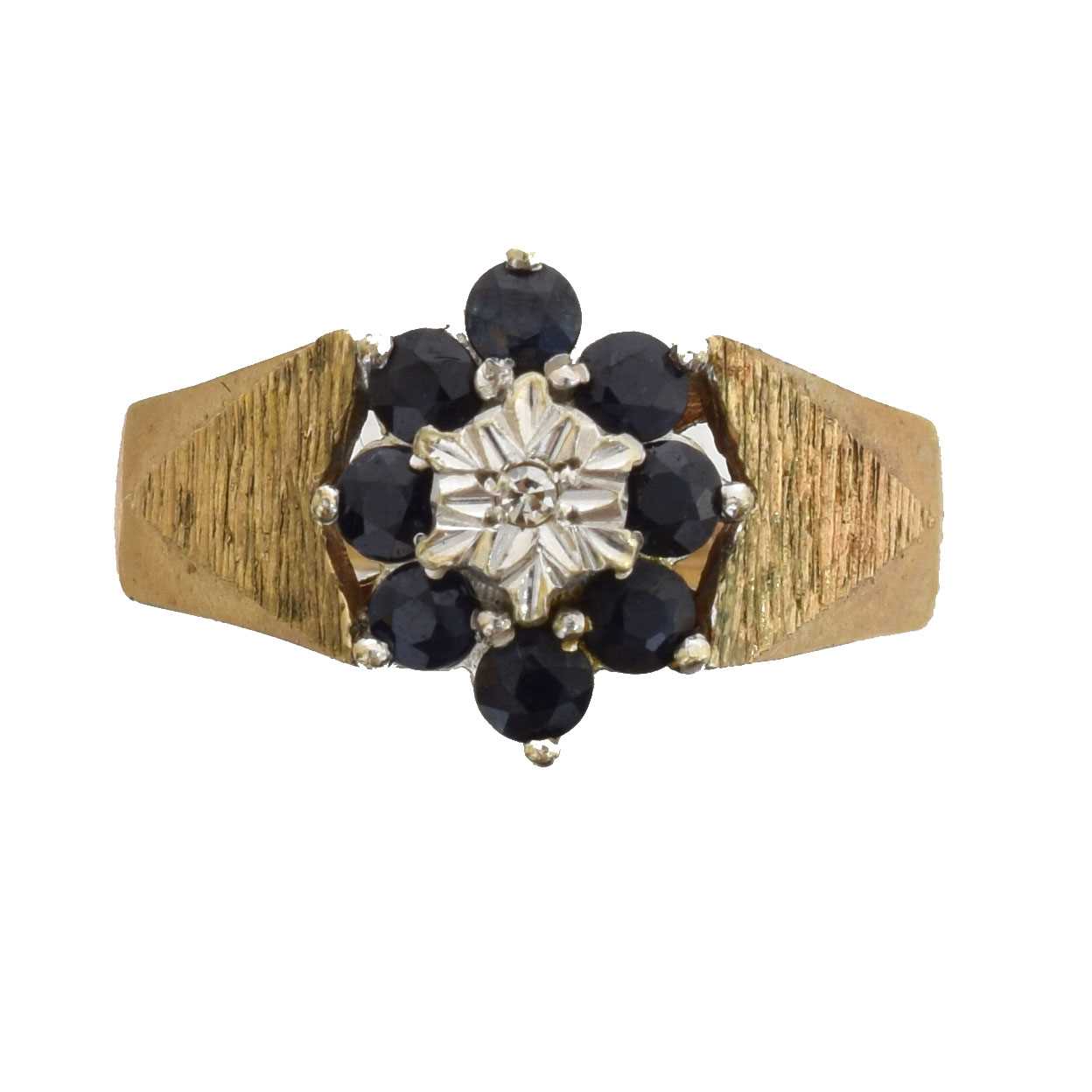 Lot 36 - A 9ct gold sapphire and diamond cluster ring.