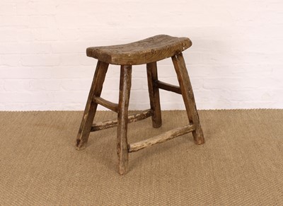 Lot 210 - A Late 19th/Early 20th Century Primitive Stool
