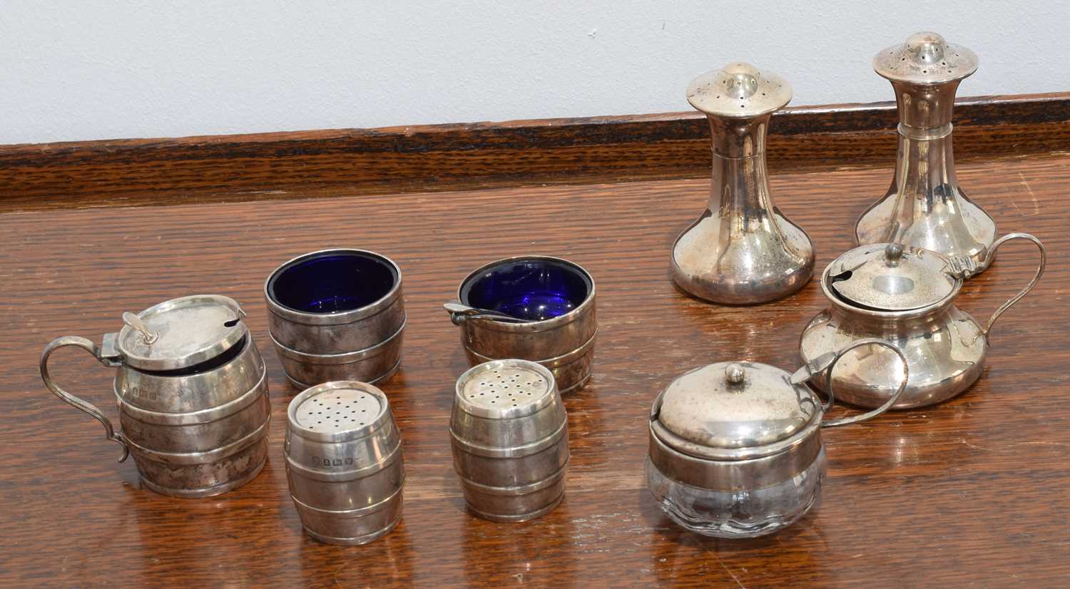 Lot 73 - A selection of silver cruet items.