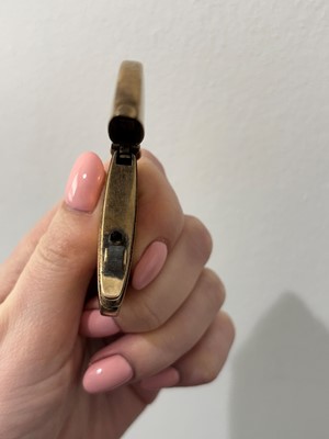 Lot 83 - A 9ct gold lighter.