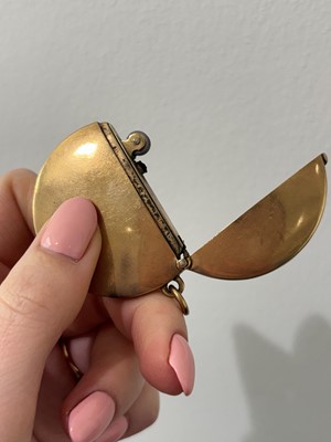 Lot 83 - A 9ct gold lighter.
