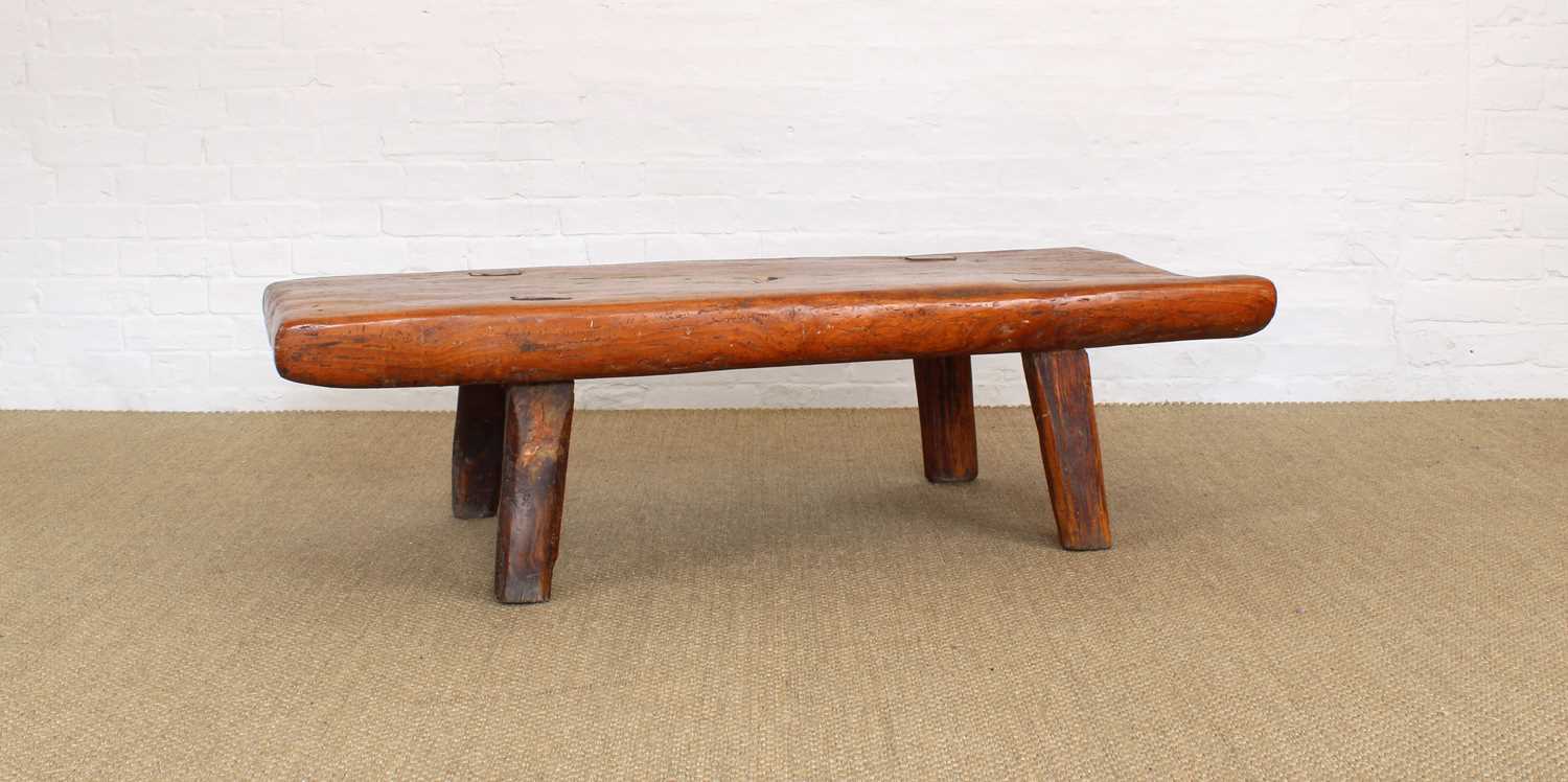 Lot 151 - A Vernacular Elm Hog or Pig Bench Dated 1900