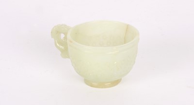 Lot 17 - A Small Chinese Ming Dynasty Carved Celadon Jade Cup