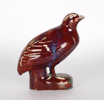 Lot 54 - An Unusual Chinese Pottery 'Sang de Boeuf' Glazed Quail Figure