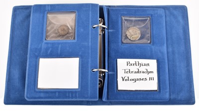 Lot 25 - An album of various coinage to include a silver denarius and a silver Tetradrachm