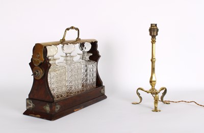 Lot 255 - A Victorian 'Betjeman's Patent' Style Tantalus with Decanters
