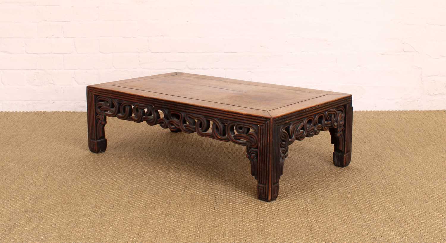 Lot 200 - A Late 19th/Early 20th Century Chinese Carved Rosewood Low Table