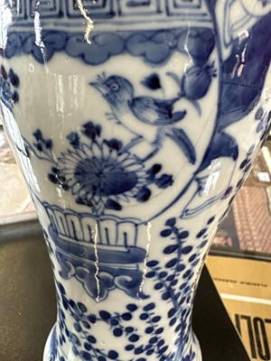 Lot 10 - A Pair of Late 19th Century Chinese Blue and White Slender 'Meiping' Vases with Covers