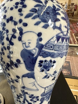 Lot 10 - A Pair of Late 19th Century Chinese Blue and White Slender 'Meiping' Vases with Covers