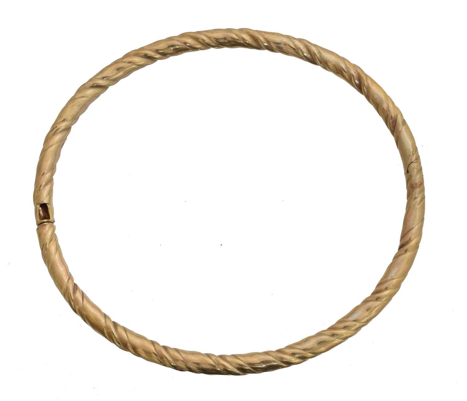Lot 13 - A hinged bangle.