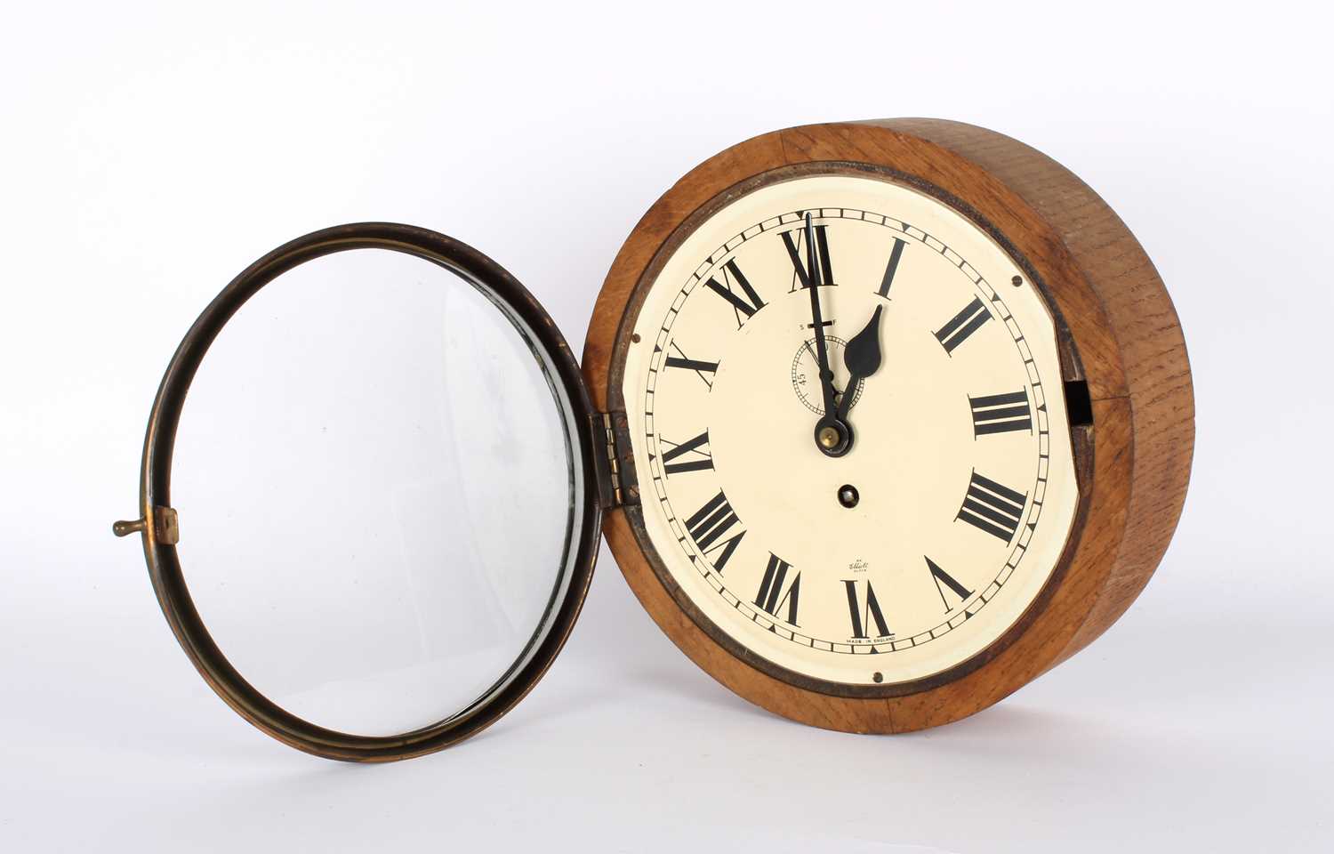 Lot 61 - An Early-Mid 20th Century Oak Cased Wall Clock by Elliott with 7 1/2" Dial